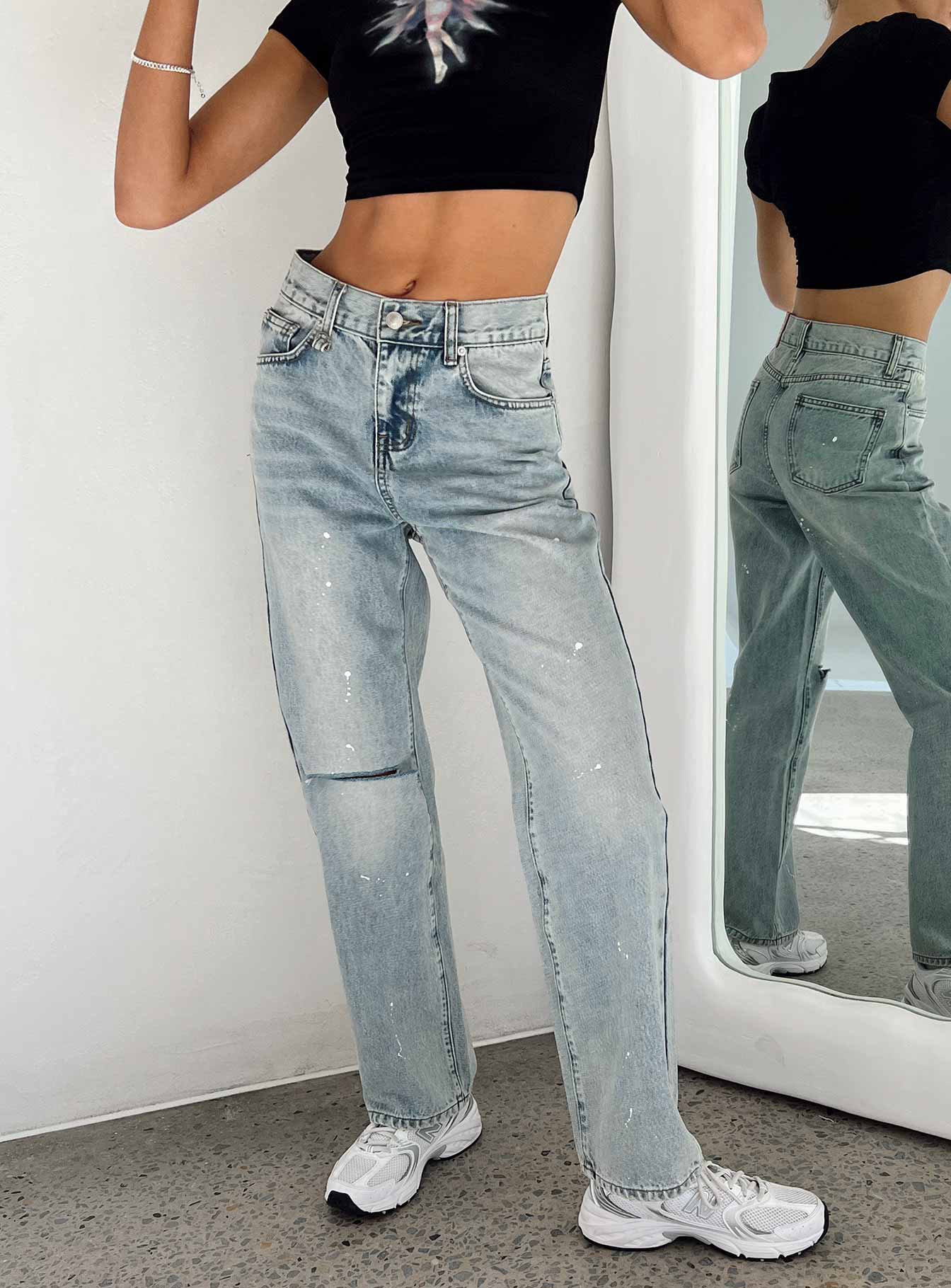 Jeans Light wash denim Paint splatter detail Belt looped waist Classic five-pocket design Zip & button fastening High waisted Ripped knees