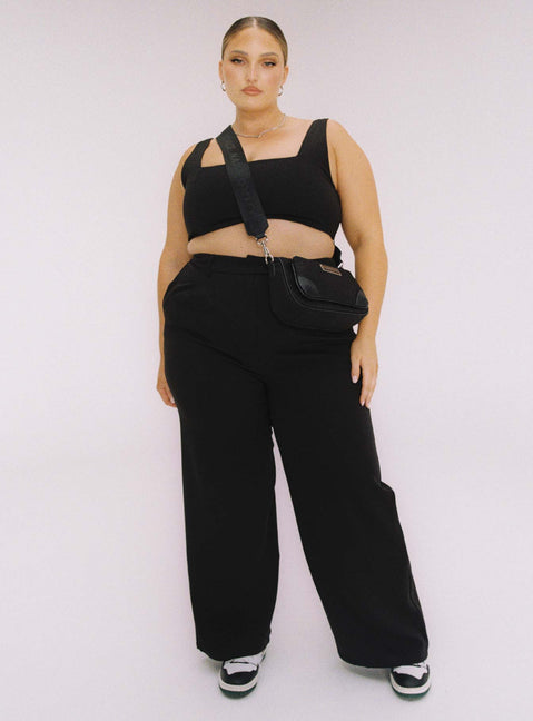Black matching set Crop top Fixed straps Invisible zip fasting at side High waisted pants Wide relaxed leg Belt loops at waist Zip & button fastening