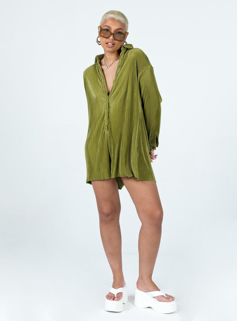 Green romper Silky material  Pleated design  Classic collar  Button front fastening  Drop shoulder  Button fastening at cuffs Raw cut hem 