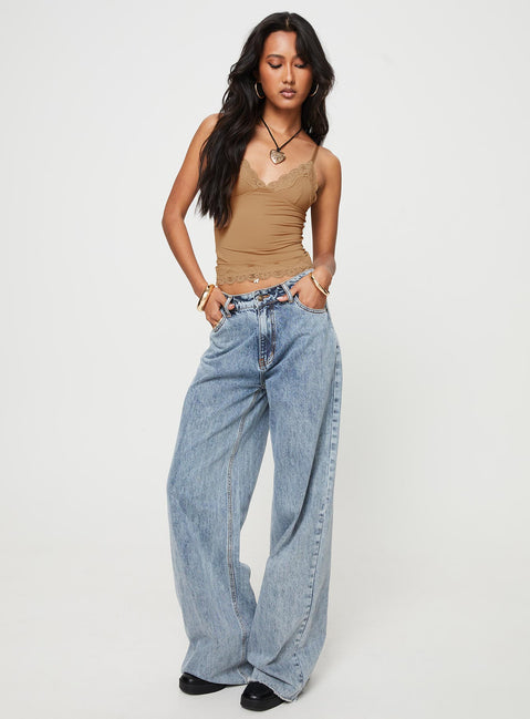 V-neckline cami Adjustable shoulder straps, lace trim