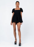 Black romper Muslin look material Square neckline Elasticated puff sleeves Shirred back panel Invisible zip fastening at back Relaxed leg