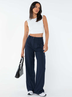Tailored pants Front button and zip fastening, belt looped waist, subtle pleats at waist, twin hip pockets