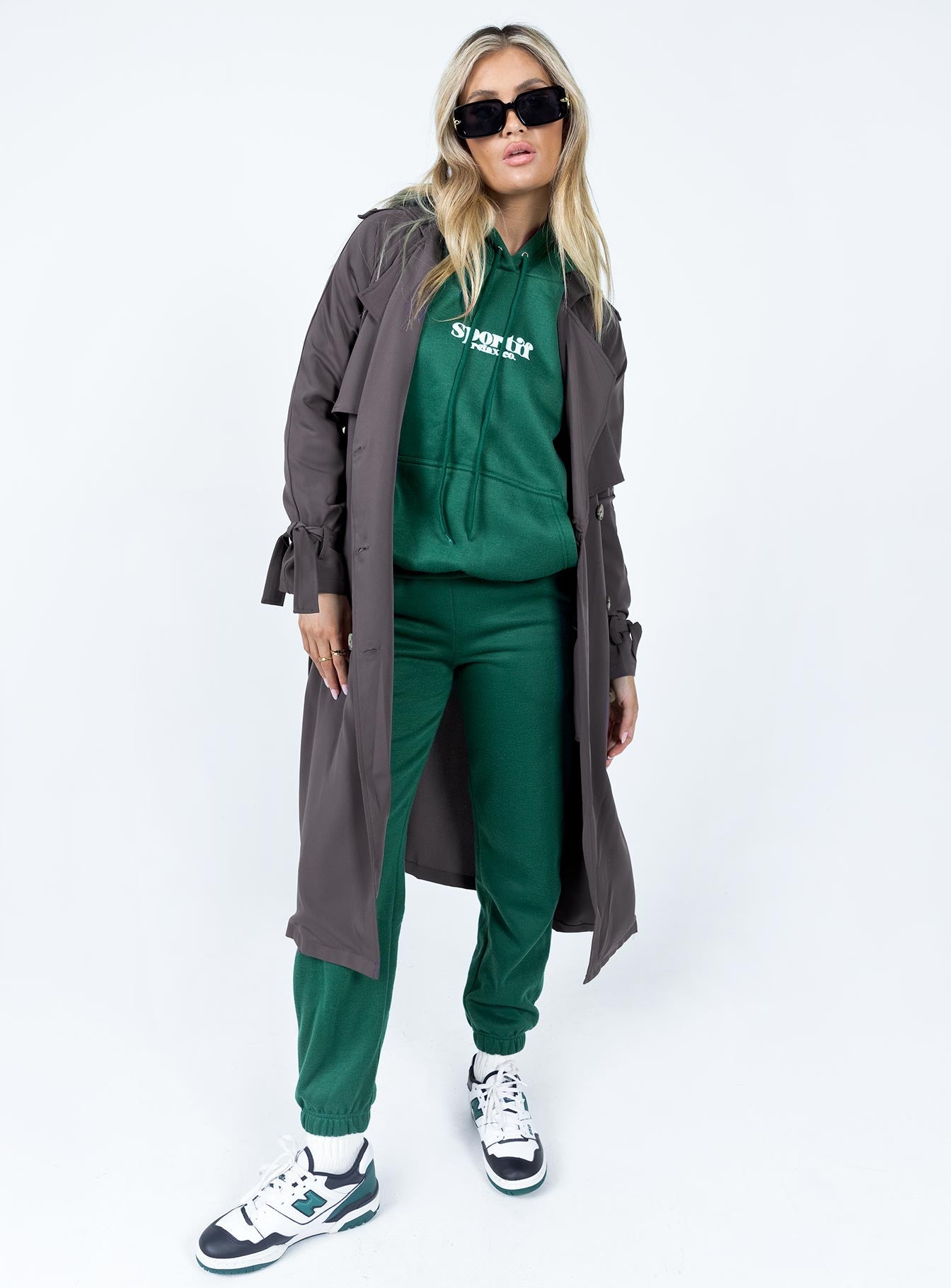 Trench coat Relaxed fit 100% polyester Wide lapel collar  Double-breasted front Tie fastening at cuffs  Belt loops with detachable belt Twin hip pockets