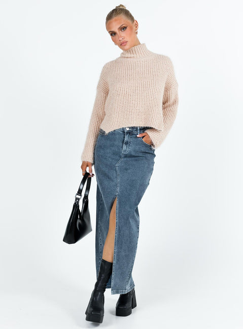 Sweater Knit material Mock neck Drop shoulder Good stretch Unlined 