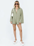 Long sleeve romper Textured material  Classic collar Button fastening at front Good stretch