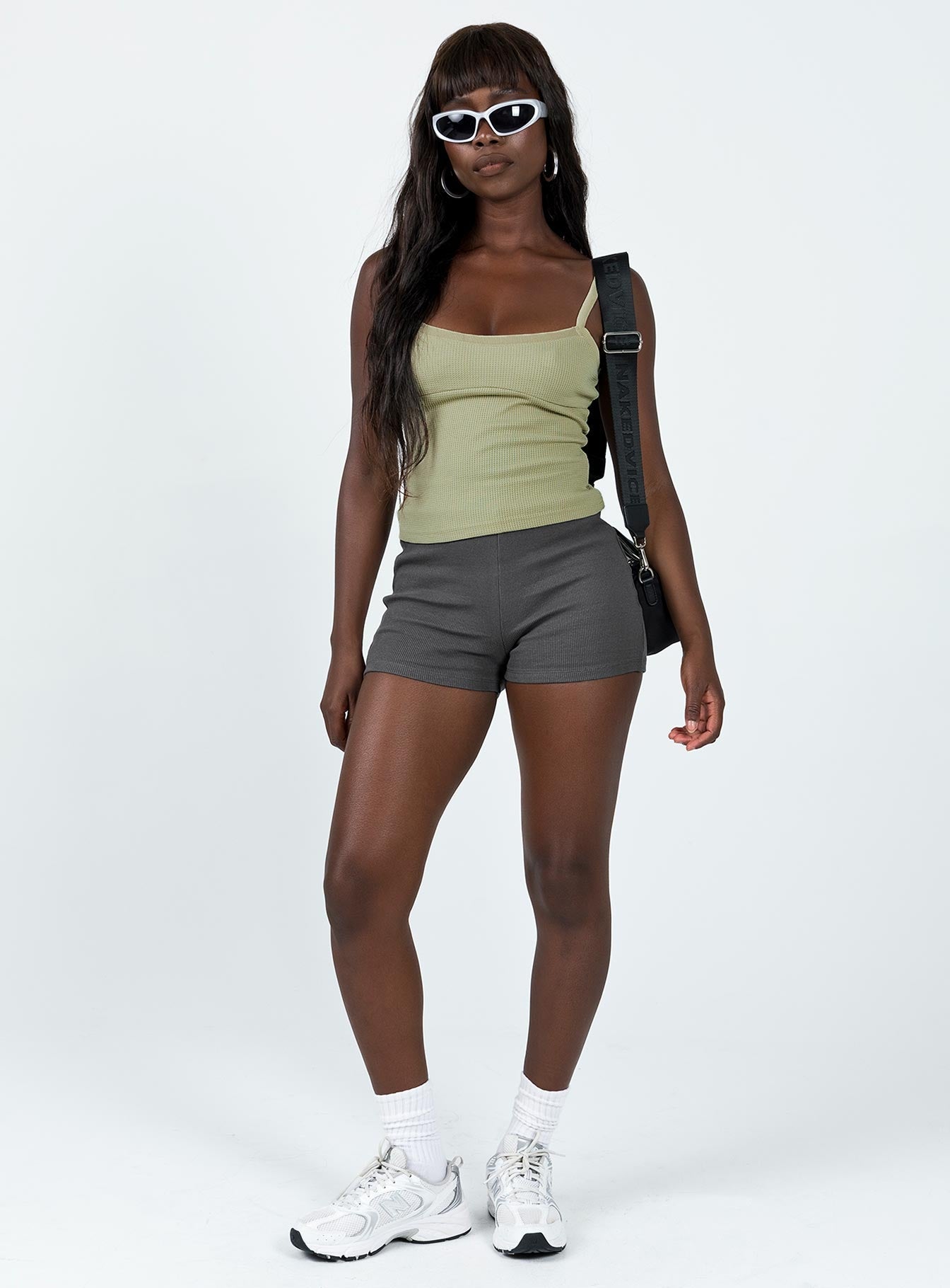 Tank top Waffle knit material Adjustable shoulder straps   Good Stretch Partially lined  