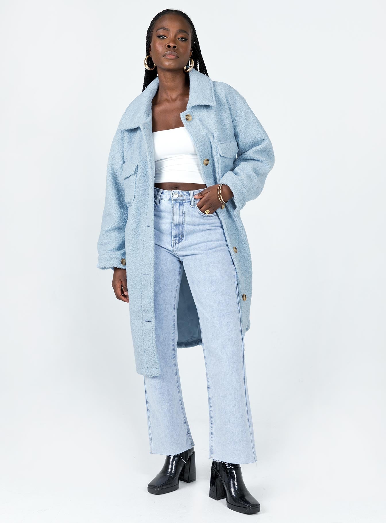 Oversized jacket Faux fur material  Classic collar Button front fastening  Twin hip pockets 