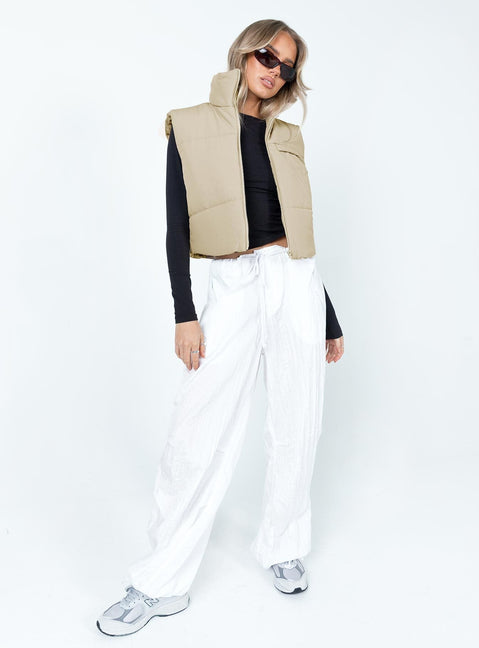 Cream puffer vest High neck Zip front fastening  Faux chest pocket 