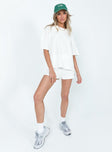 White matching set Relaxed fit Delicate knit material - wear with care  Oversized tee  Drop shoulder  High waisted shorts  Elasticated waistband 