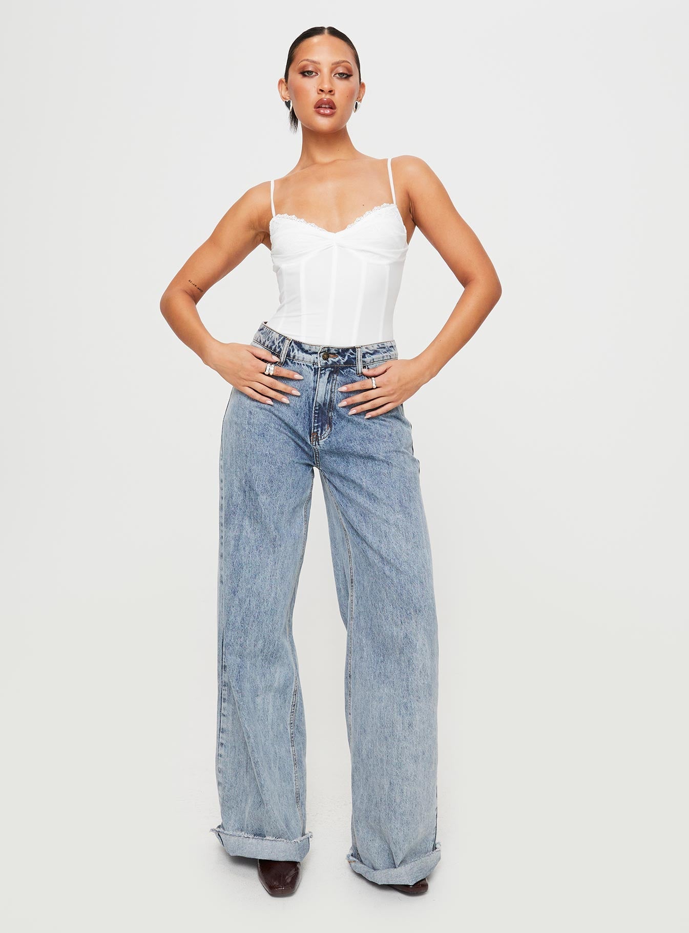 Mesh bodysuit Boning throughout, adjustable shoulder straps, sweetheart neckline, lace detail, wired cups, g-string style bottom, press clip fastening