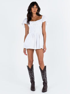 White romper Elasticated shoulders & neckline  Tie at bust  Shirred waist  Twin hip pockets  Fully lined 