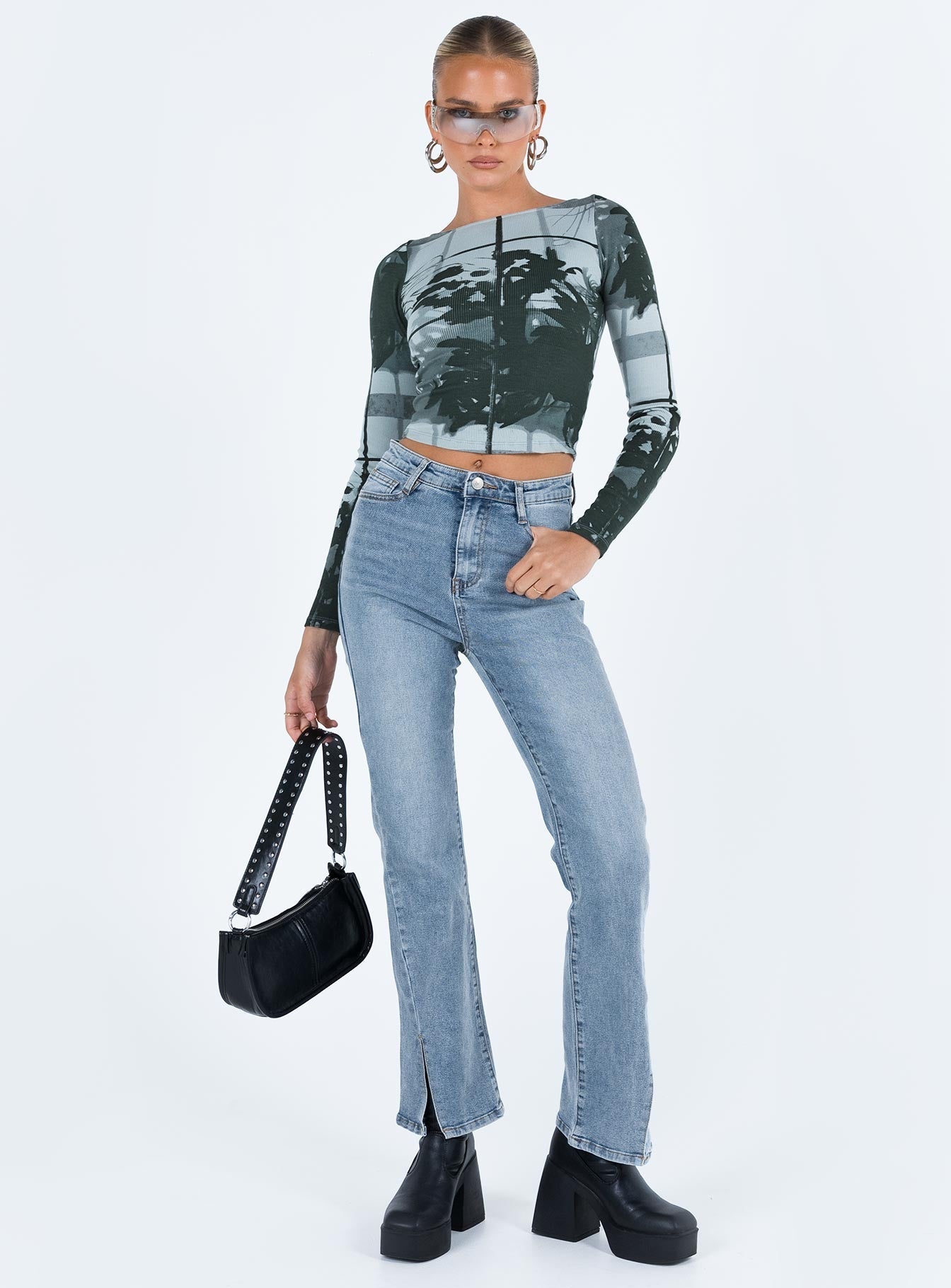 Jeans Mid wash denim Flared fit Front button & zip fastening  Belt looped waist Classic five pocket design Split hem Some stretch Unlined 