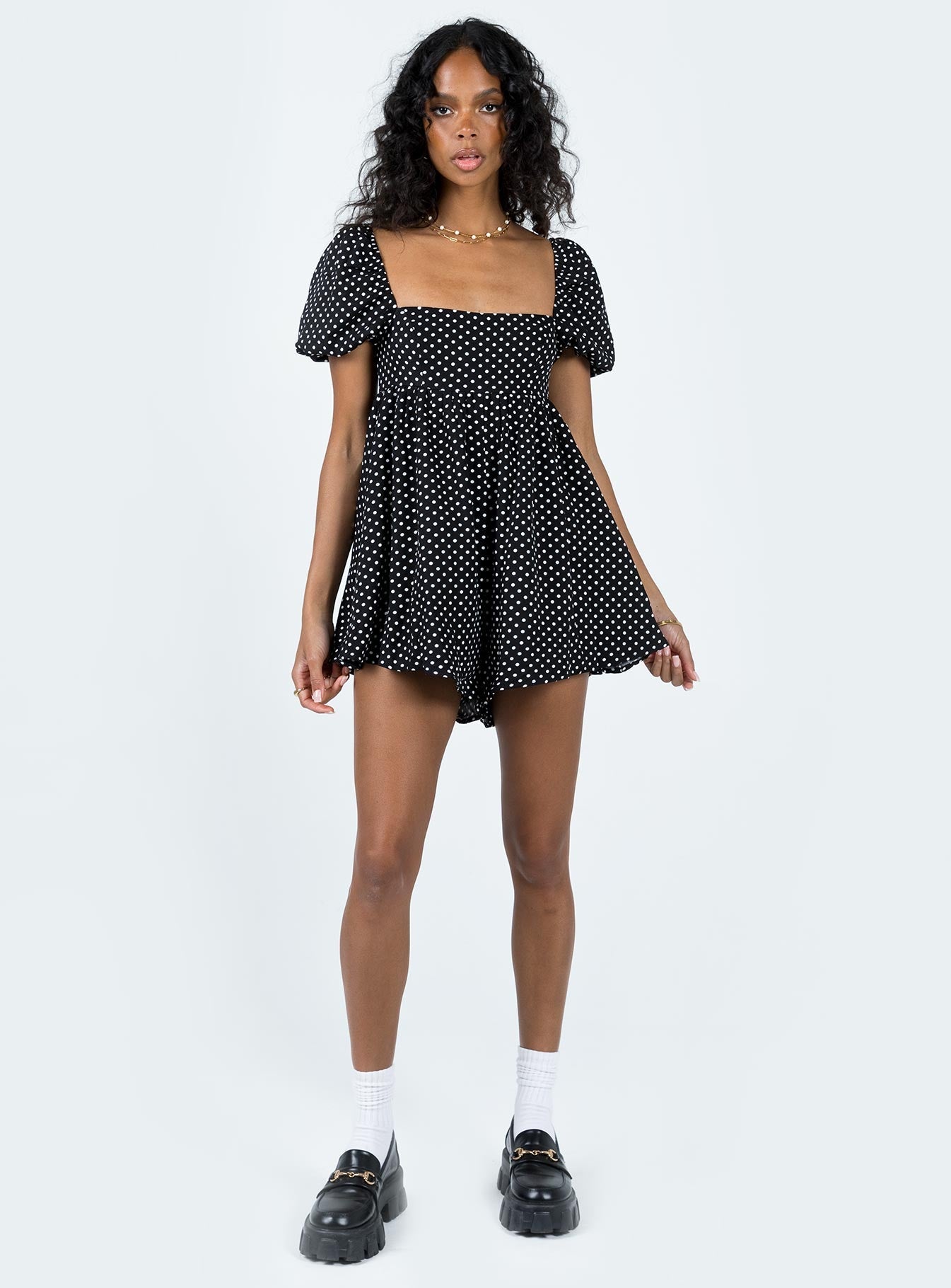 Romper Polka dot print Square neckline  Elasticated puff sleeves Shirred back panel Invisible zip fastening at back  Relaxed leg 