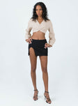 Long sleeve top Classic collar  Button front fastening  Cropped design  Elasticated waistband at back  Single button cuff 