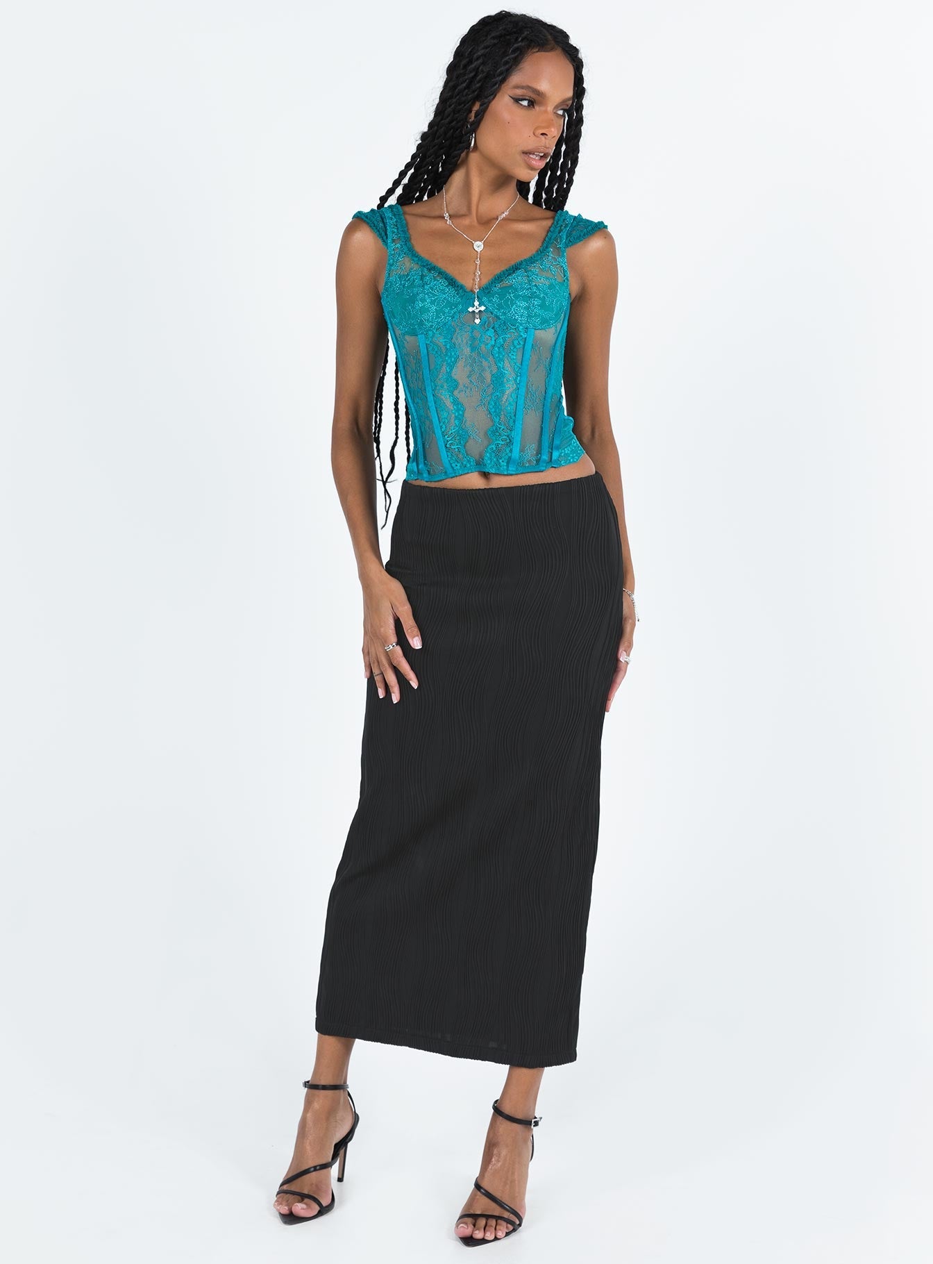 Black maxi skirt slim fitting Textured material Invisible zip fastening at back Slight stretch