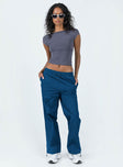 Pants Windbreaker material Elasticated waistband with drawstring Twin hip pockets Straight leg Drawstring cuffs