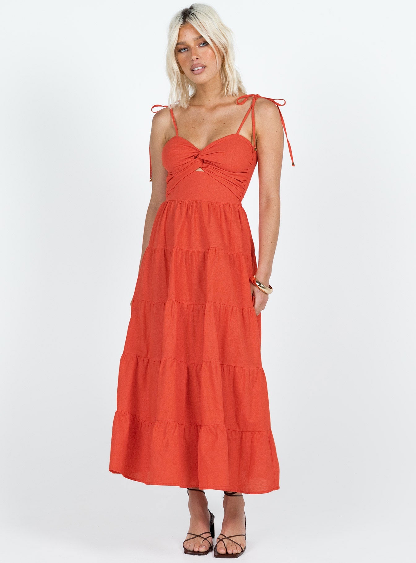 Midi dress Tie fastening shoulder straps Knot detail at bust Shirred band at back Cut out at waist Invisible zip fastening at back Tiered skirt