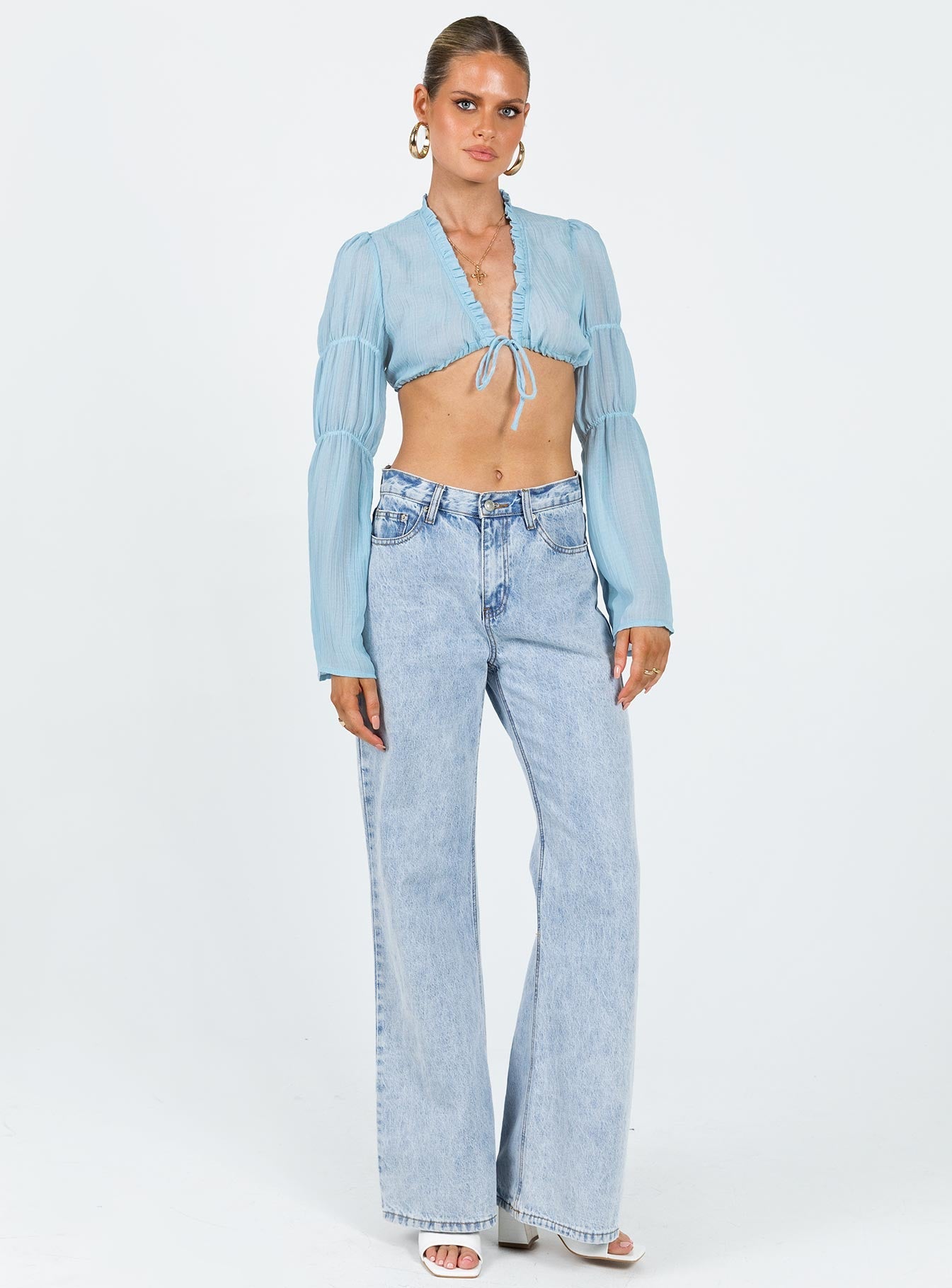 Blue long sleeve crop top Open front Tie fastening Elasticated sleeve detail Adjustable coverage Frill detail