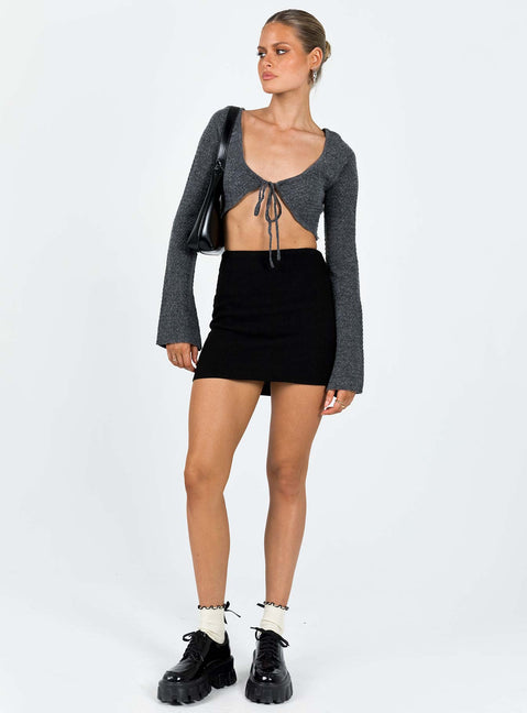 Bolero Knit material V neckline Tie fastening at bust Flared sleeve  Good stretch Unlined 