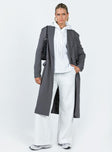 Trench coat Lapel collar Twin hip pockets Split at back