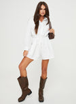 Long sleeve romper Classic collar, button fastening at front, front chest pocket, drawstring waist with tie fastening, twin hip pockets
