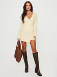 Long sleeve mini dress, knit material Wrap design with tie fastening at side, slightly flared cuff Good stretch, unlined 
