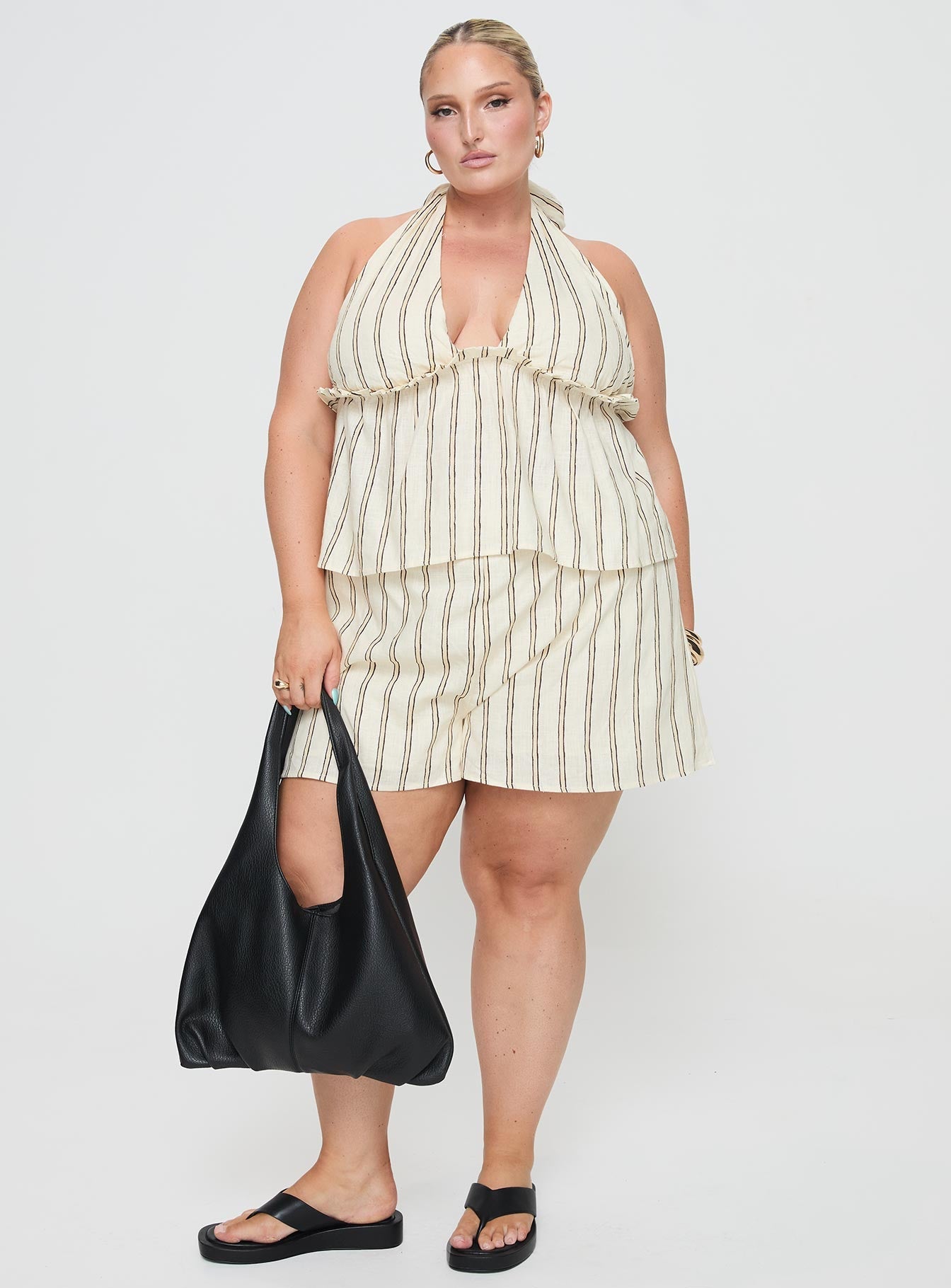 Princess Polly Curve  Striped linen set Halter neck top, tie fastening, elasticated band under bust, v-neckline High-rise shorts, elasticated waistband, twin hip pocket Non-stretch material, partially lined  Princess Polly Lower Impact