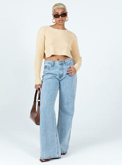 Cream sweater Ribbed knit material Wide neckline Side slits