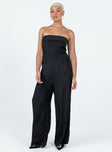 Strapless jumpsuit Folded neckline Inner silicone strip at bust Invisible zip fastening at back