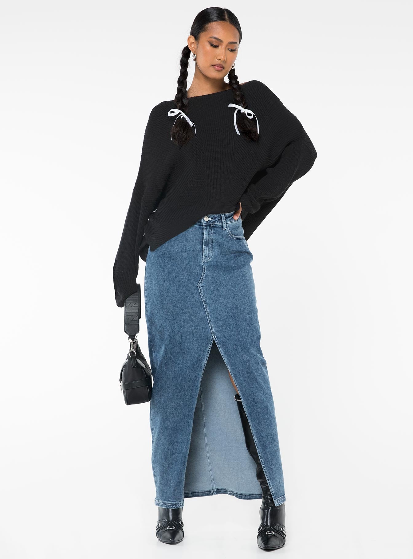 Knit sweater Wide neckline, drop shoulder, split at side hem Good stretch, unlined 