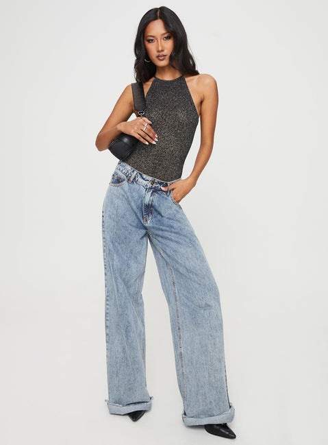 Bodysuit Sheer shimmery lace material, halter style with tie fastening, open back, breif cut leg, cheeky style Press clip fastening at base 