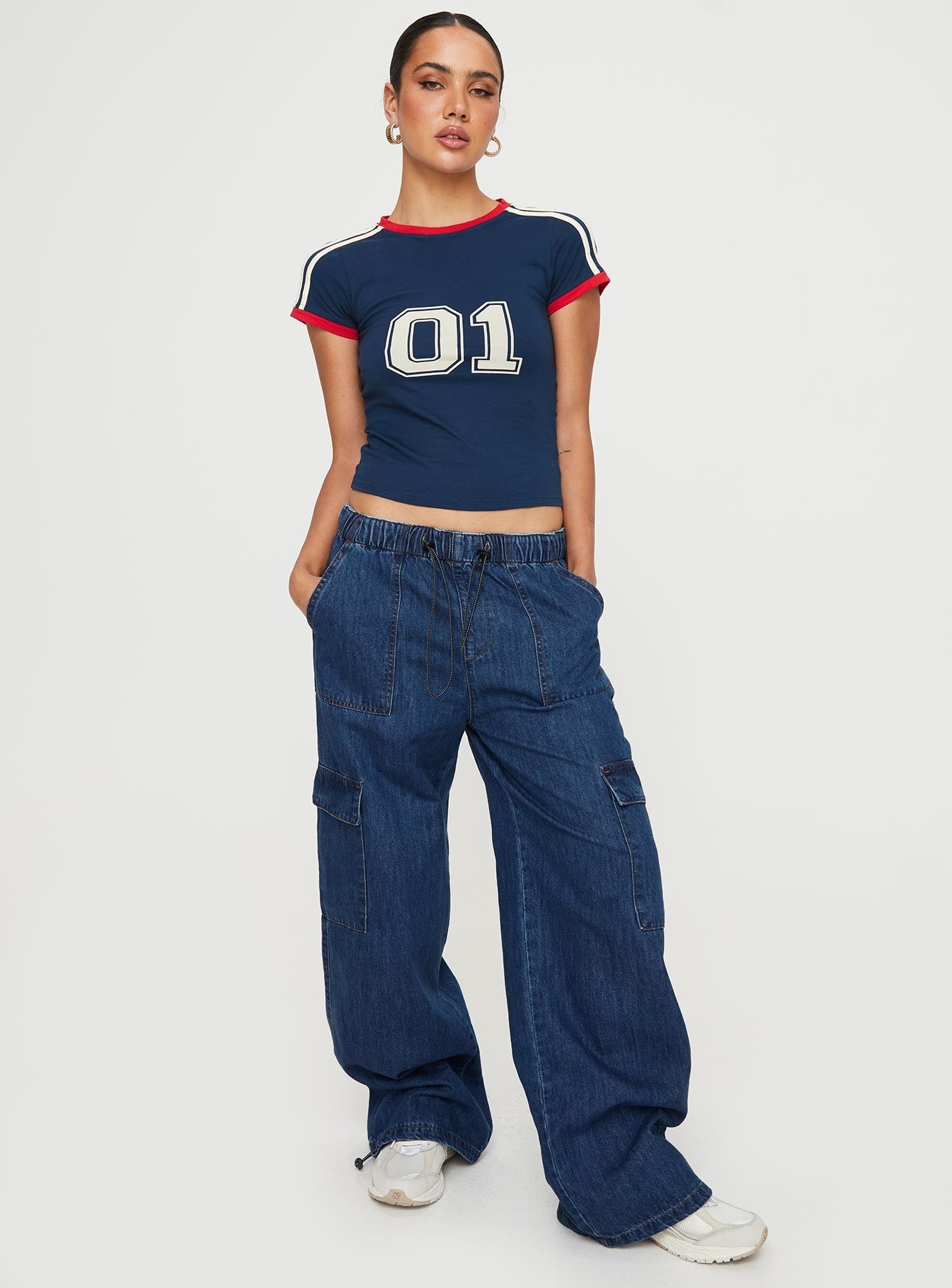 Cargo Jeans High waisted, twin hip pockets, cargo style pockets, twin back faux pockets Elasticated waist band with drawstring & cuff Non-stretch, unlined 