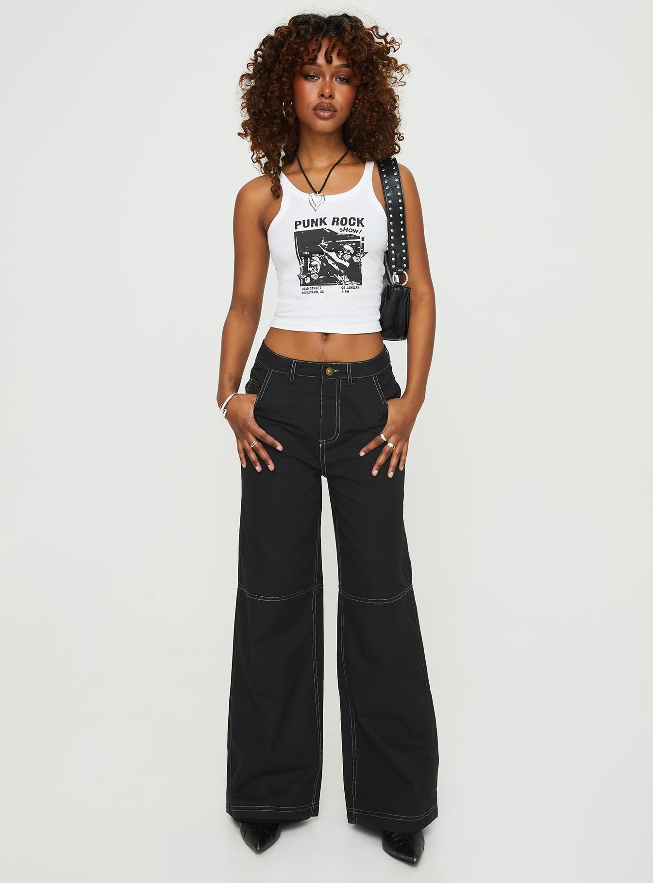 Tank, graphic print  Slim-fitting, fixed straps Non-stretch material, unlined 