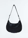 Bag Adjustable strap Black toned hardware Zip fastening Internal zip and card slip pockets