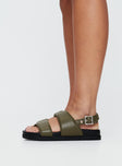 Strappy faux leather sandals Double strap upper, ankle strap with buckle fastening, rounded toe, treaded sole