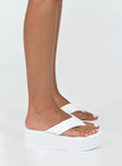 Sandals Faux leather material  Flip-flop style upper  Platform base  Square toe 