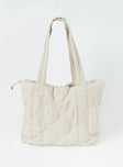 Beige tote bag Quilted design  Contrast stitching  Twin handles  Zip fastening Three internal pockets Fully lined