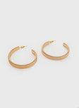 Gold-toned earrings Hoop style, stud fastening