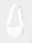 Crossbody bag Heart shaped Faux fur material Fixed strap Magnetic button fastening
