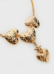 Gold-toned necklace Chunky design, heart pendants, lobster clasp fastening