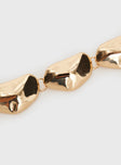 Gold toned toned bracelet Lobster clasp fastening, chunky style