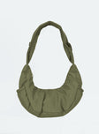 Shoulder bag Fixed adjustable strap Zip fastening  Two slip pockets at side Internal pockets Flat base
