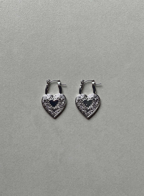 Earrings Hoop style  Silver-toned Latch fastening  Heart design