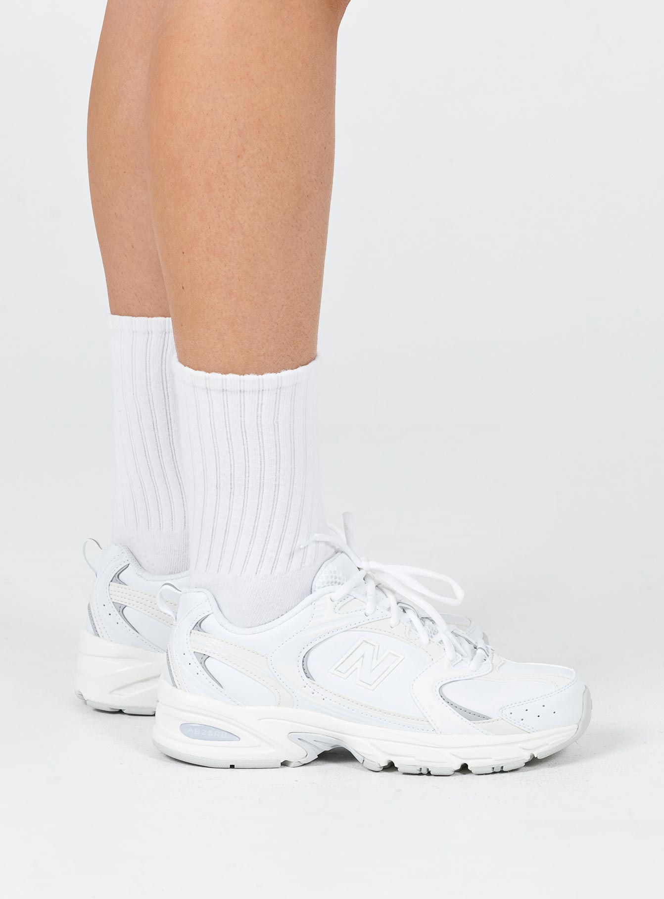 Sneakers Faux leather Lace-up fastening Pull tab at heel Treaded sole Padded footbed