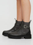 Faux suede boots Rounded toe, pull tab, treaded sole, silver-toned buckles Elasticated gusset at side, padded footbed