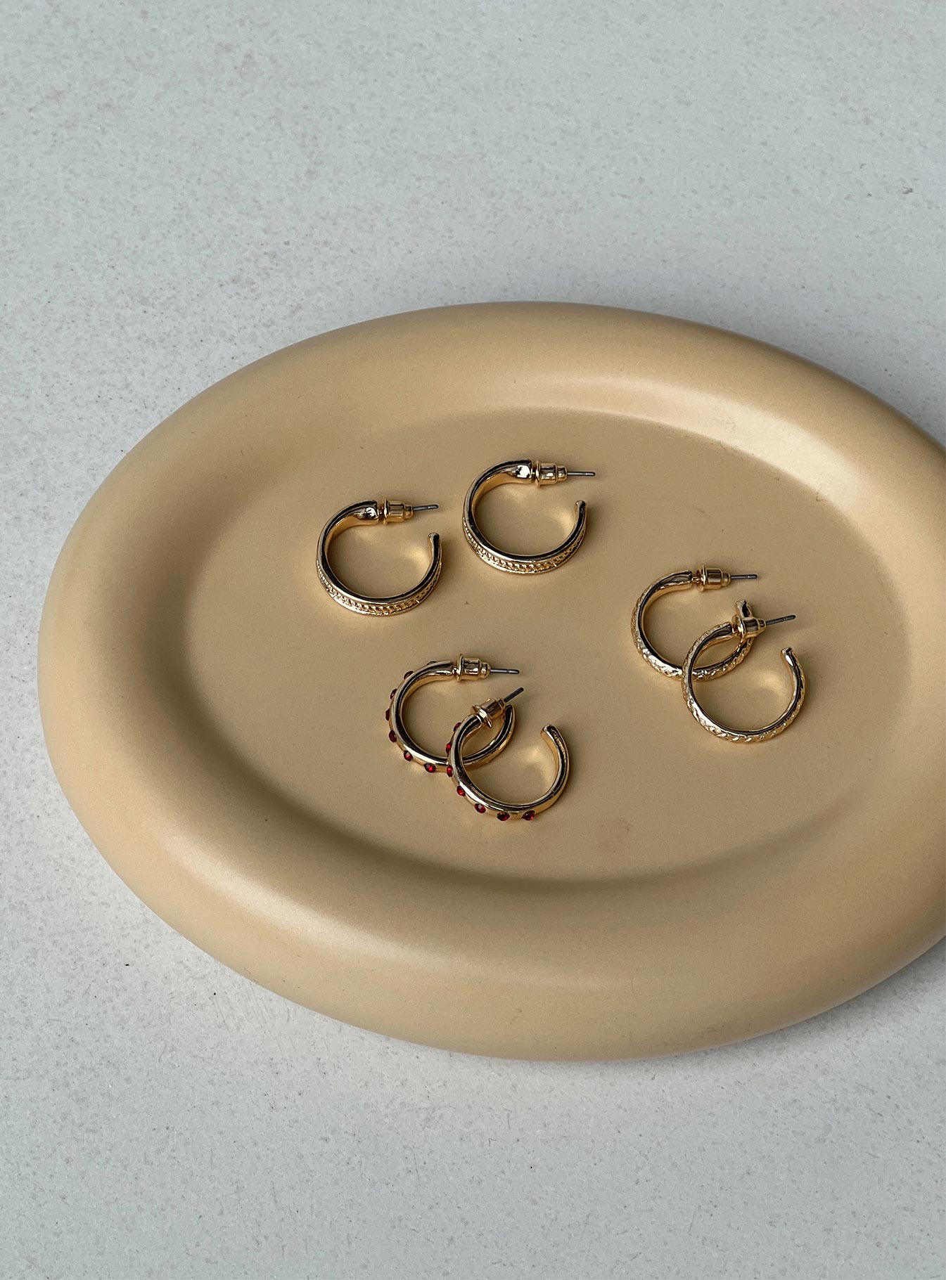 Earrings Pack of three Hoop styles Ruby gem details