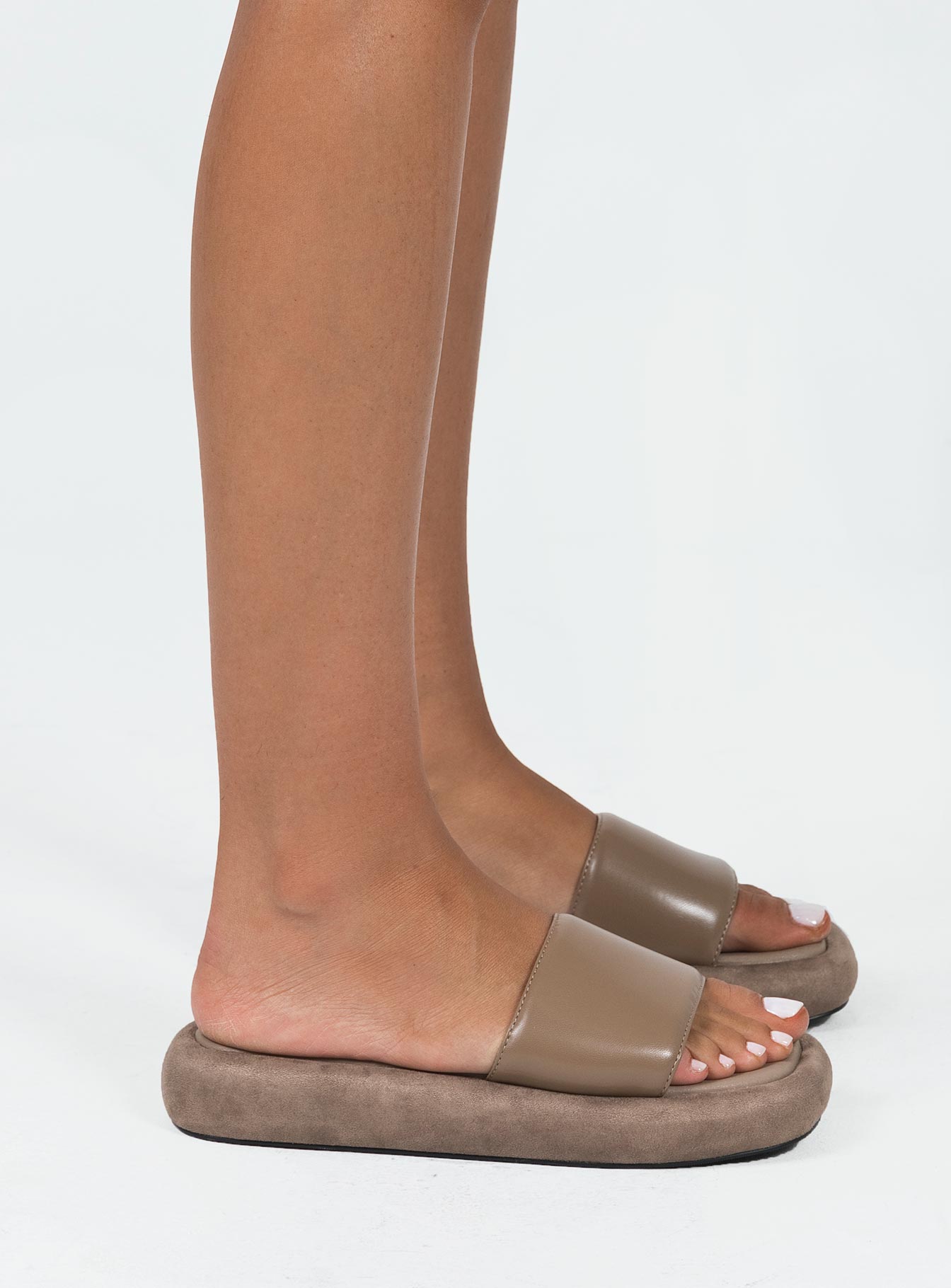 Slides Faux suede & leather material Single strap upper Padded footbed Square toe