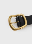 Black belt gold buckle
