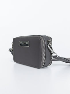 Crossbody bag Faux leather trims Adjustable & removable strap Two separate compartments Zip fastening Silver-toned hardware Branded plaque at front Flat base