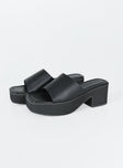 Sandals Lining: 100% Recycled PU Insole: 100% PU Outsole: 100% Rubber Faux leather material  Single wide upper  Square toe  Platform base 